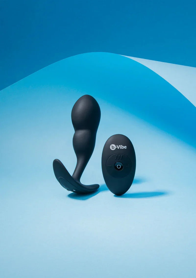 Remote Control P-Spot Snug Plug 145g by B-Vibe - Happytoys Sexshop: Toys for Feeling Happy & Easy 😊 - Discreet geleverd