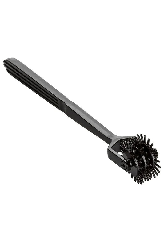 Black plastic handle with two spiked rotating wheels attached for massage or sensory stimulation