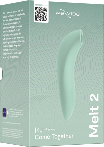 Mintgroene vibrator op verpakking met WE VIBE-logo en tekst