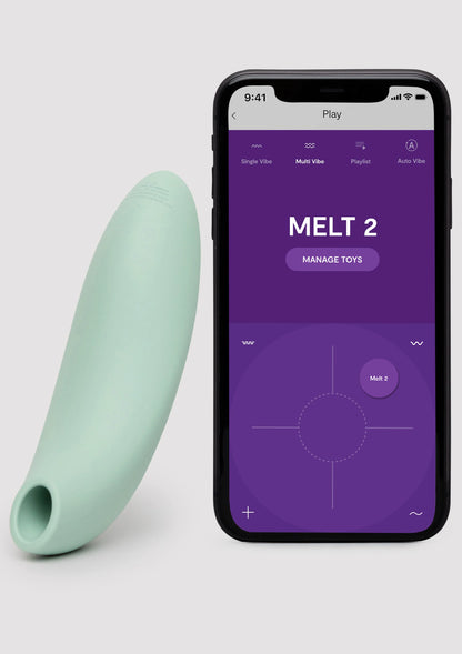 Mintgroene vibrator en smartphone met app-interface