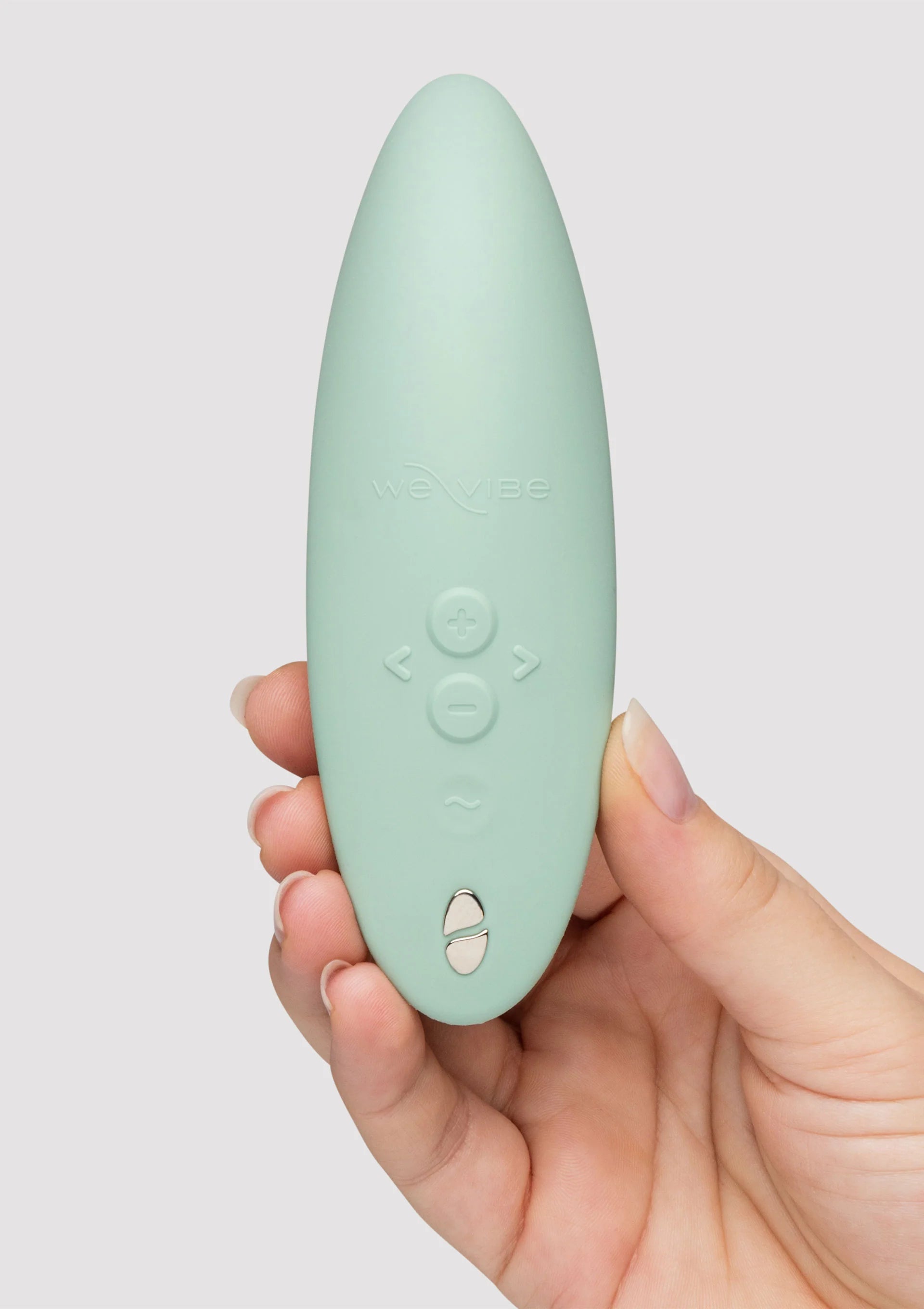 Mintgroene vibrator achterzijde met bedieningsknoppen en logo