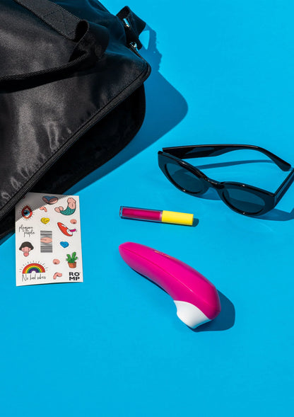 Roze lucht-druk vibrator met wit opzetstuk
