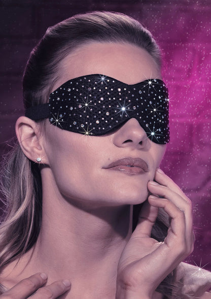 Zwart oogmasker met fonkelende steentjespatroon over de ogen
