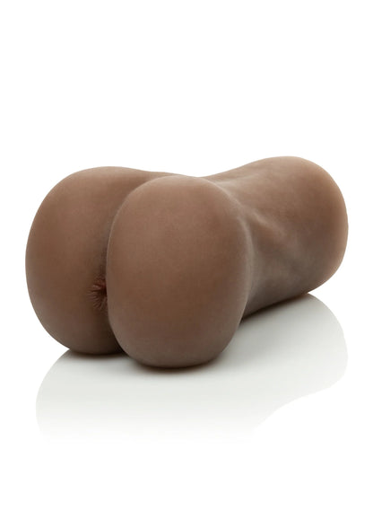 Bruine siliconen masturbator met ronde billen, zijdelingse close-up