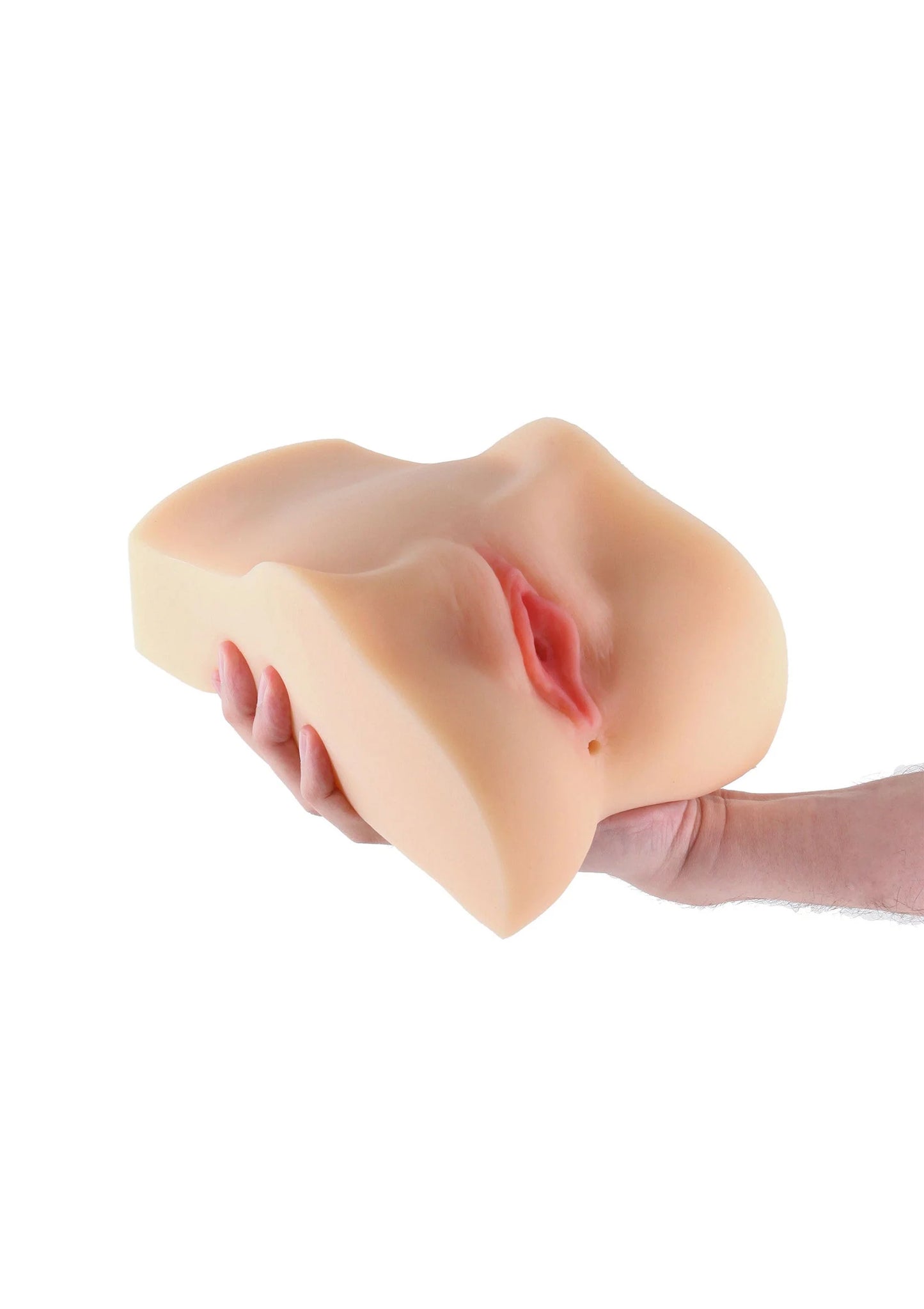 Fleshtone masturbatiehulpmiddel in hand, opening en neerwaartse vorm
