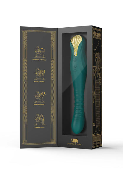 Zwarte productverpakking met gouden koning-illustratie en naam op de voorkant.