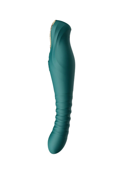 Groen seksspeeltje met goudkleurige rand bij de kop.