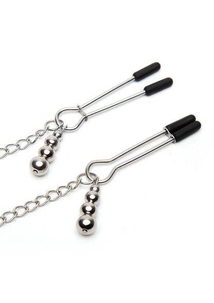 Set metalen nippelklemmen met zwarte handgrepen en ronde kettingdetails