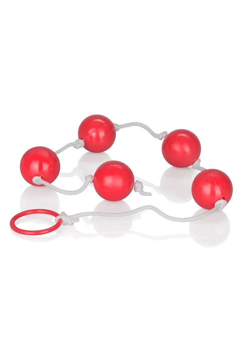Large red anal beads with white string and pull ring on white background