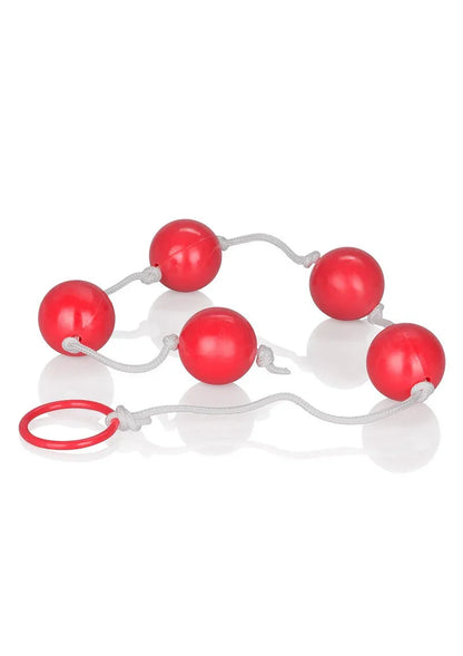 Large red anal beads with white string and pull ring on white background